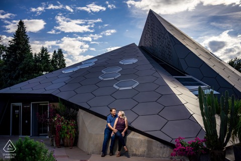 At the Denver Botanic Gardens in Colorado, the couple posed on the pyramid building, capturing their love and excitement before their upcoming wedding day.